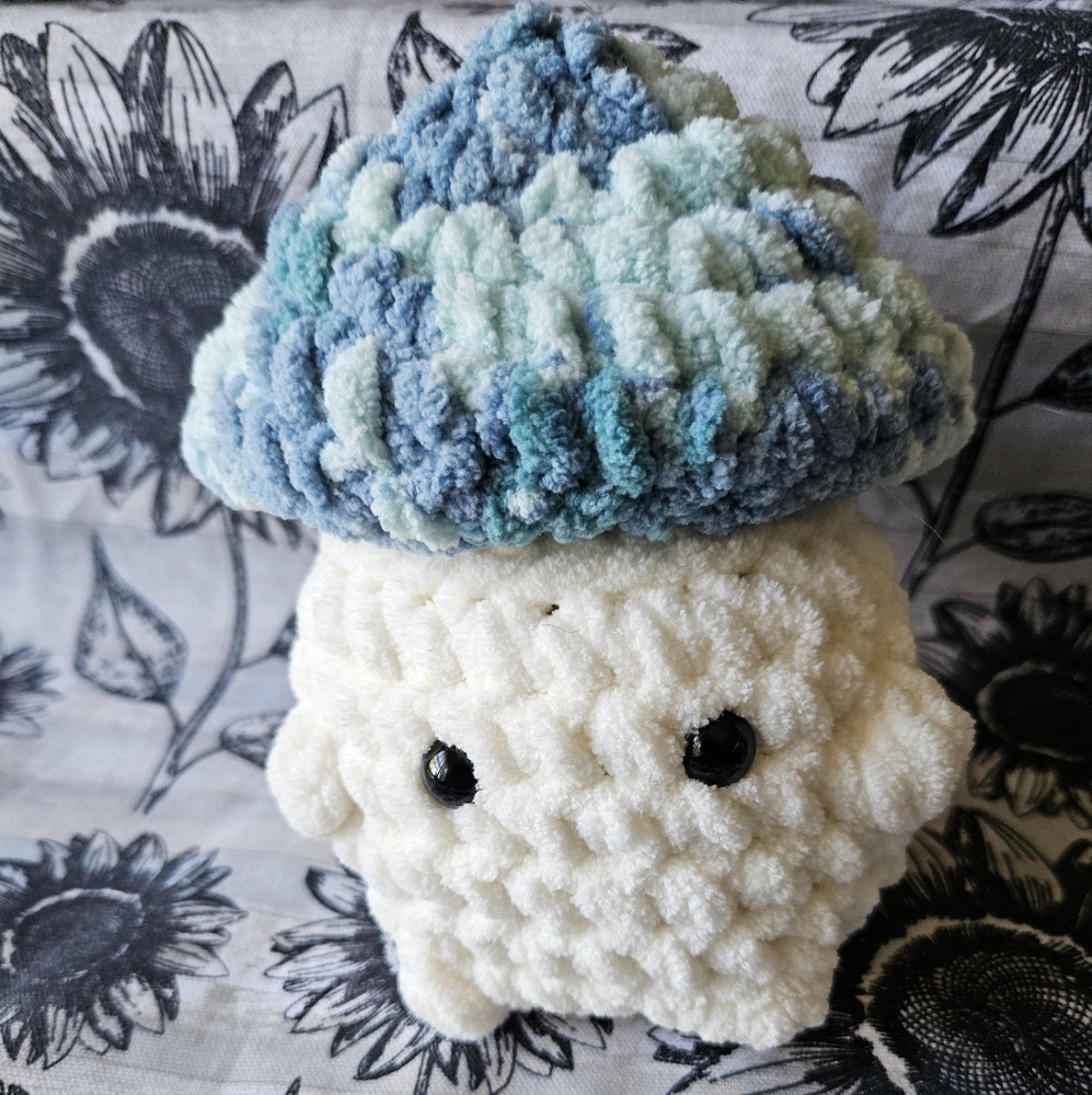 Light blue crochet pop it mushroom fidget plush